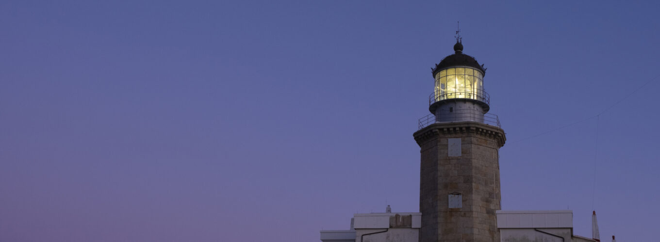 the moon over the lighthouse of matxitxako, bizkaia
