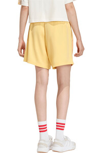 adidas pantalón corto deporte mujer HOUSE OF TIRO X COMMON GOAL NARANJA vista trasera