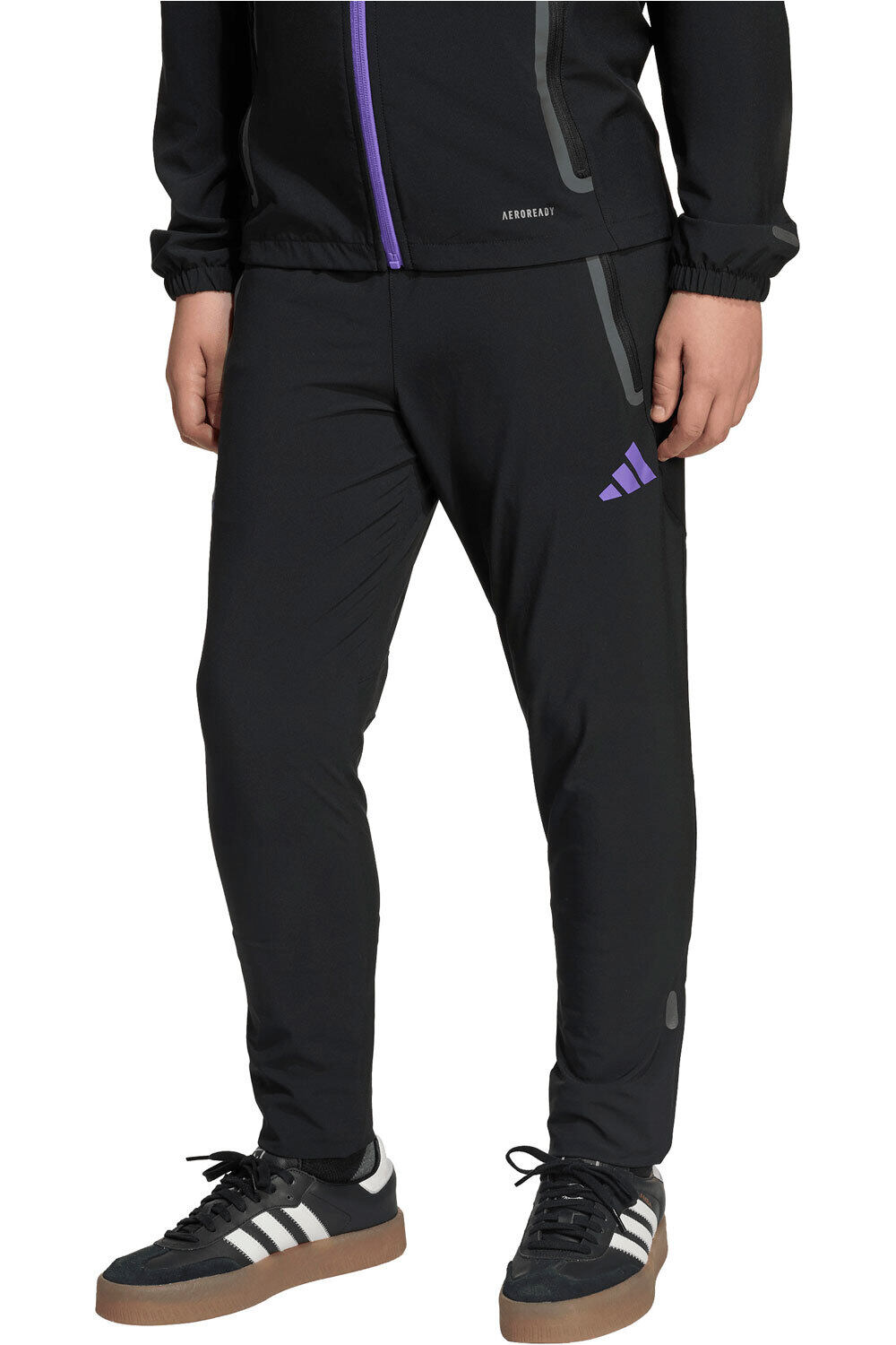 adidas pantalones largos futbol niño MANCHESTER UNITED 25/26 TRAVEL NEGRO vista frontal