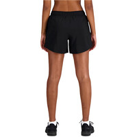 New Balance pantalón running mujer SPORT ESSENTIAL NEGRO vista trasera