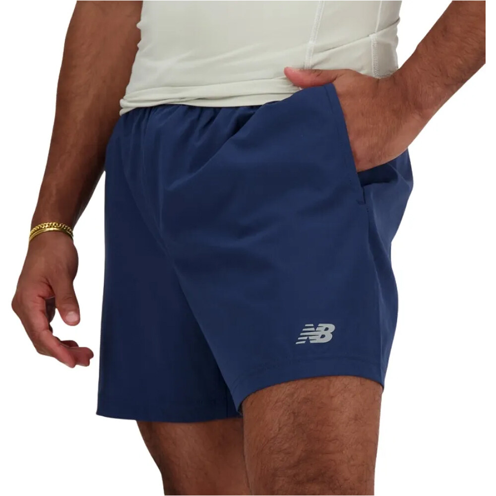 New Balance pantaloneta técnica hombre SHORT 5 INCH AZUL 03