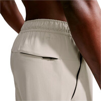 Nike pantalón hombre DRI-FIT UNLIMITED MARRON 03