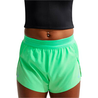 Nike pantalón running mujer W NK ARSWFT DFADV CROP TOP PKT NEGRO vista detalle