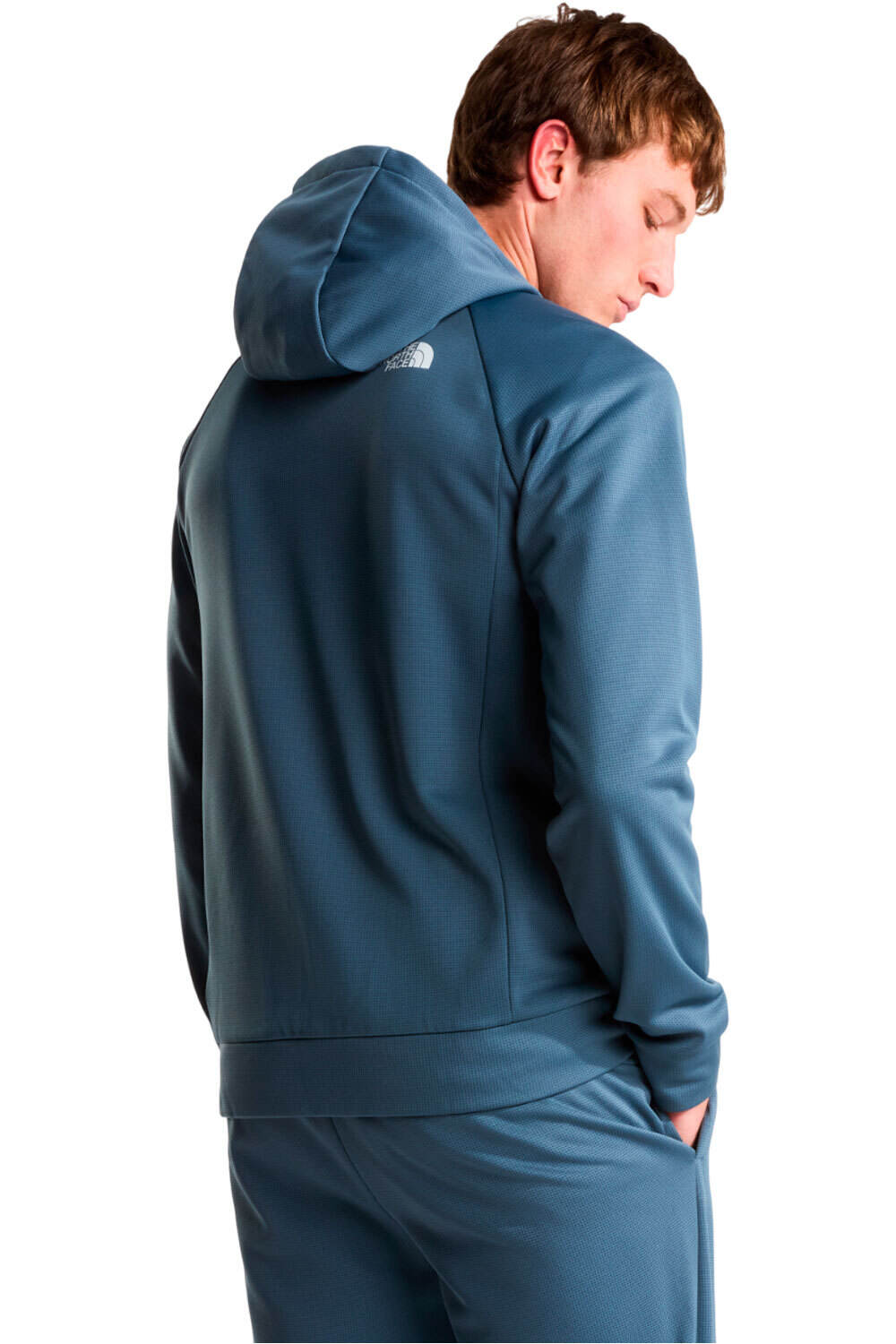 The North Face forro polar hombre REAXION 2.0 GRIS vista trasera