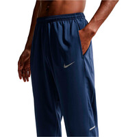 Nike malla larga running hombre M NK DF MILER WOVEN PANT vista detalle