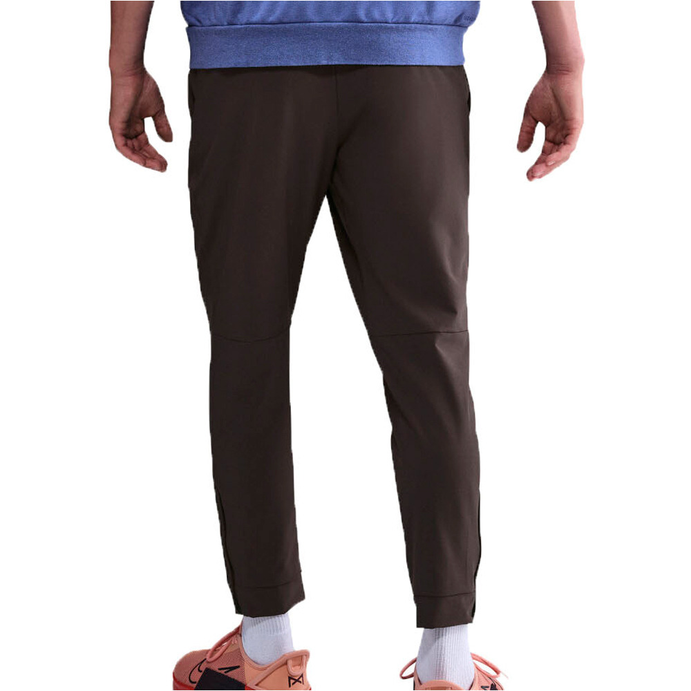 Nike pantalón hombre M NK DF UNLIMITED PANT TPR vista trasera