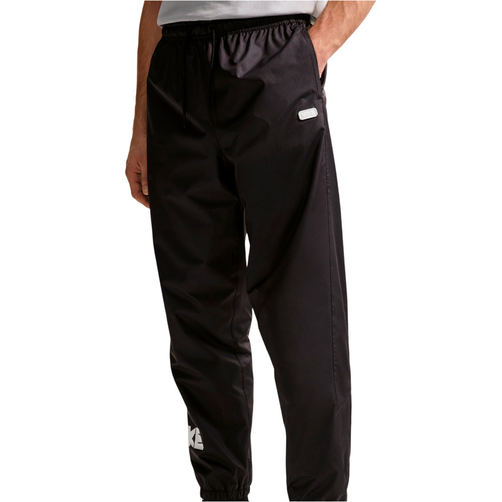 Nike pantalón hombre M NK WR GFX WVN PANT vista detalle