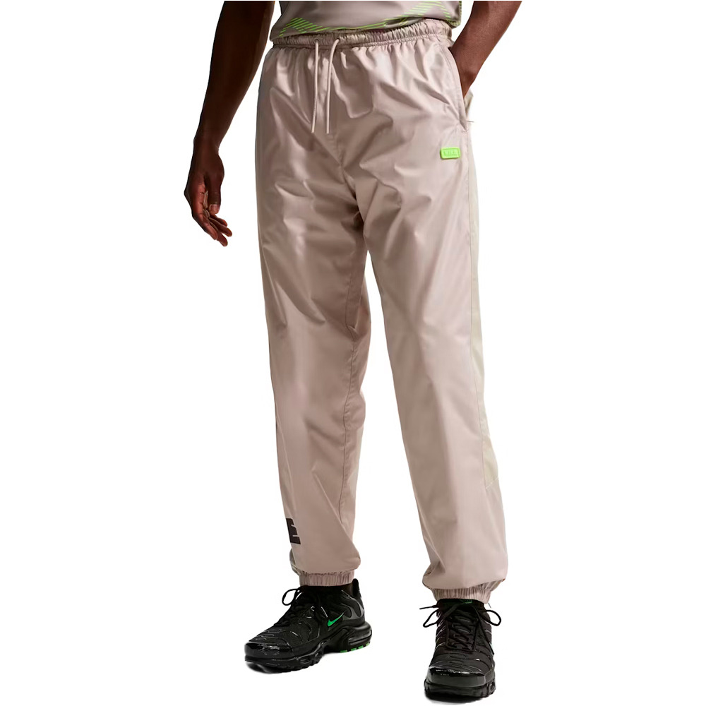 Nike pantalón hombre M NK WR GFX WVN PANT vista frontal