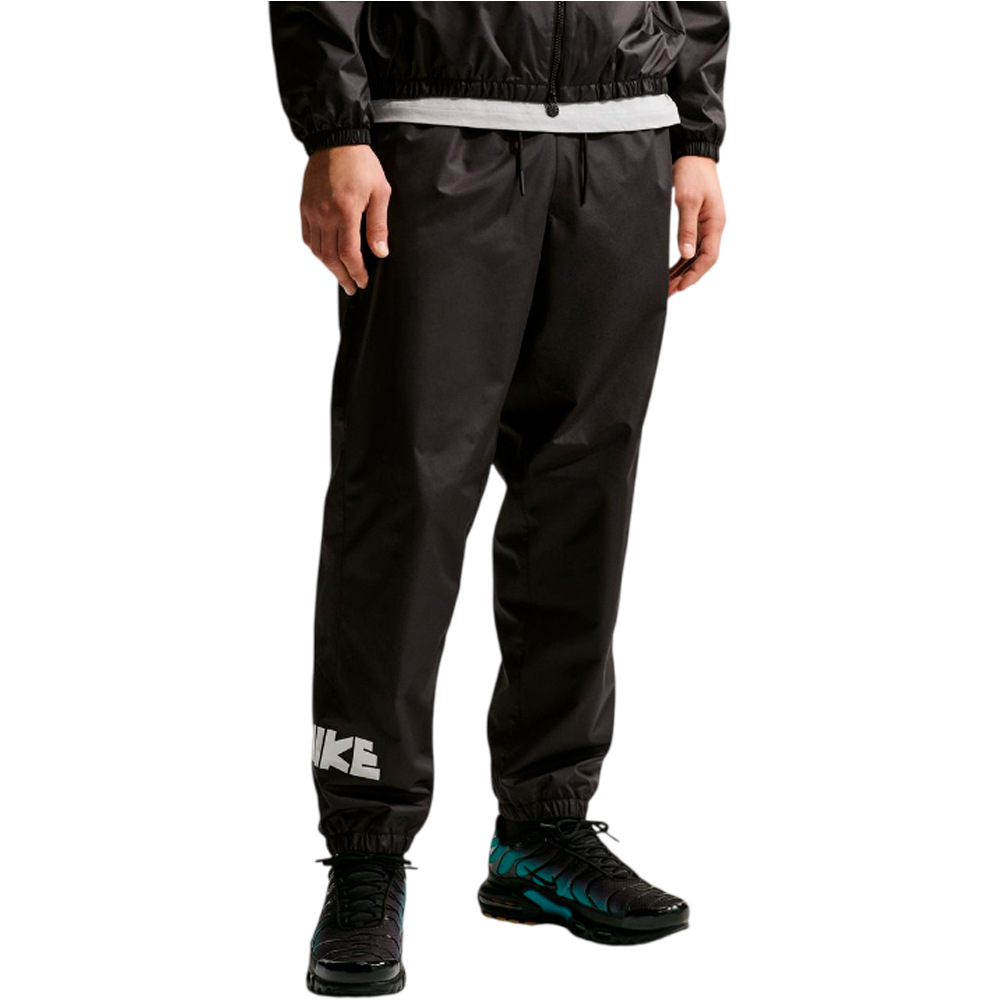 Nike pantalón hombre M NK WR GFX WVN PANT vista frontal
