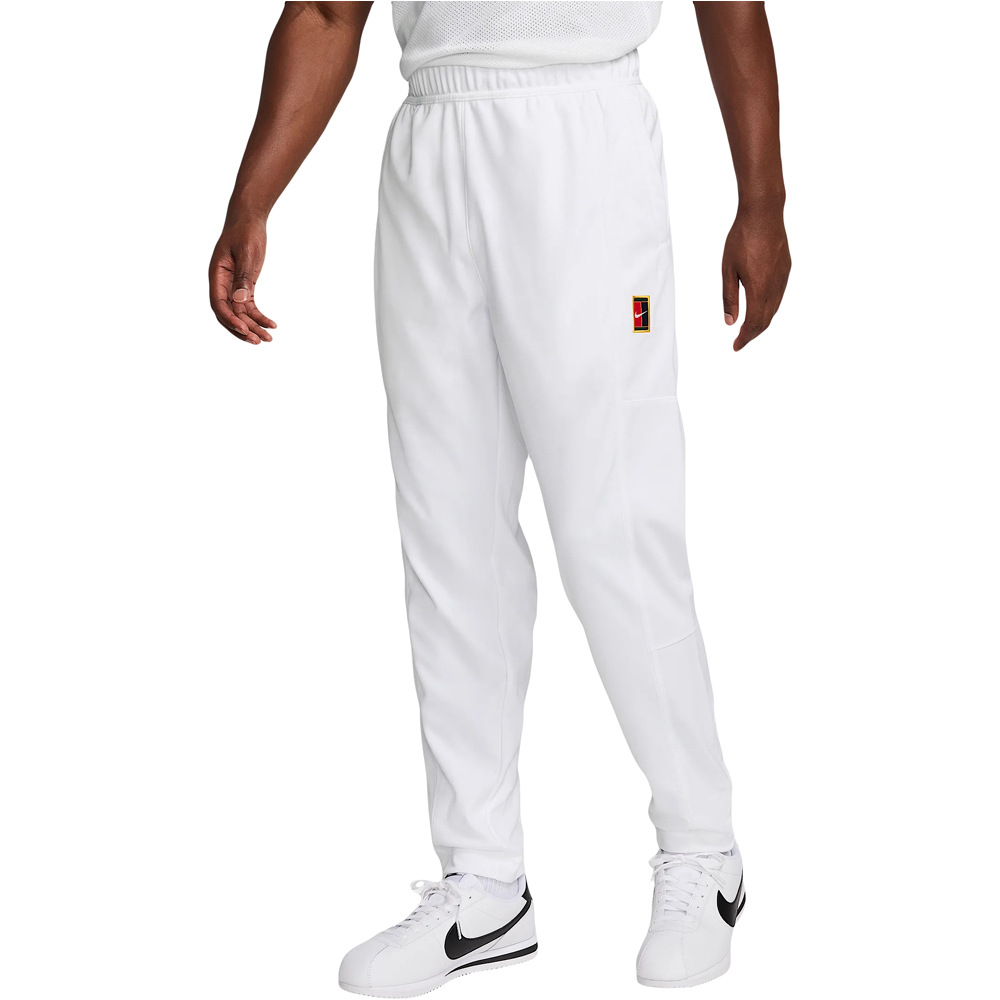 Nike pantalón tenis hombre M NKCT HERITAGE SUIT PANT vista frontal