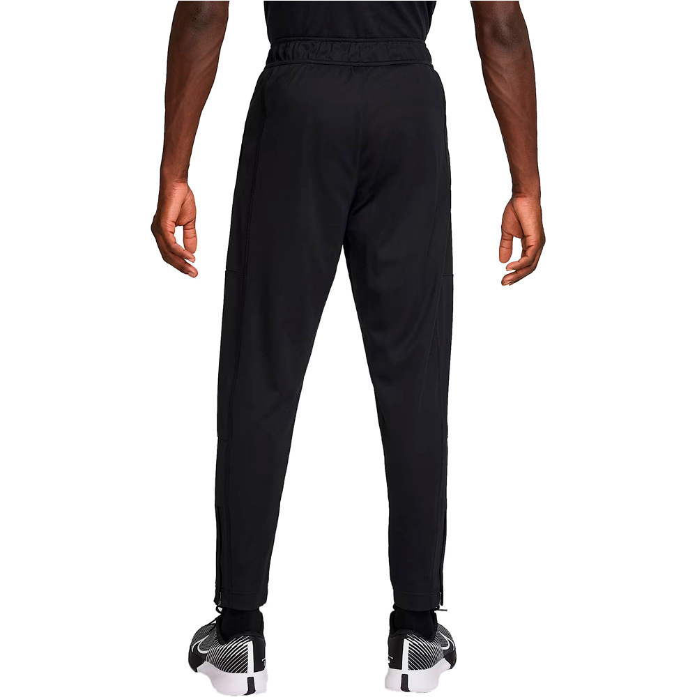 Nike pantalón tenis hombre M NKCT HERITAGE SUIT PANT vista trasera