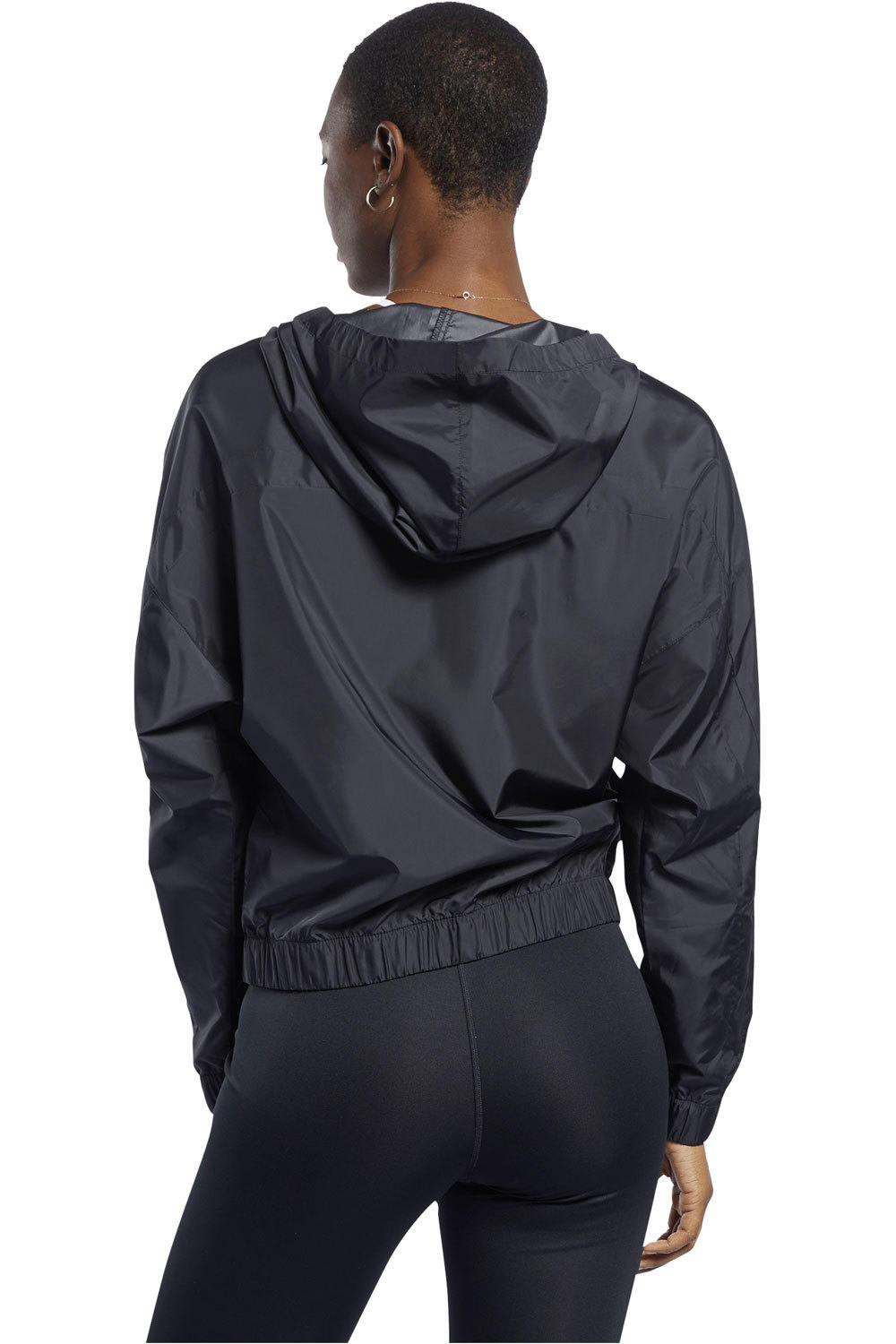 Reebok sudaderas deportivas mujer WOR COMM WOVEN JACKET vista trasera