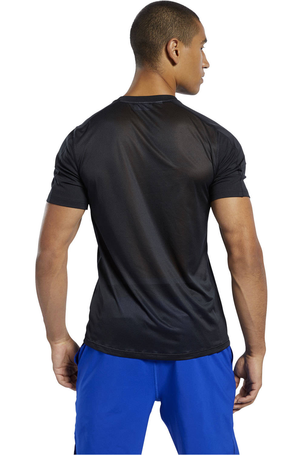 Reebok camiseta fitness hombre WOR COMM SS TECH TEE vista trasera