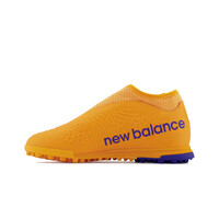 New Balance botas de futbol niño multitaco y terreno duro Tekela v3+ Magique Junior Turf lateral interior