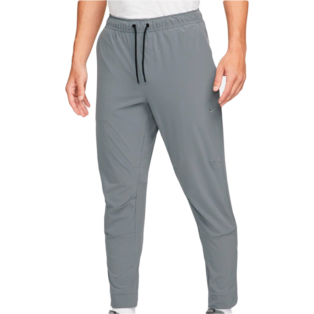 Nike pantalon fitness hombre M NK DF UNLIMITED PANT TPR vista frontal